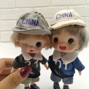 Alternative view of عروسک Ni Baby دخترکلاه دارسایزمتوسط مفصل دار14سانت-کد 2322